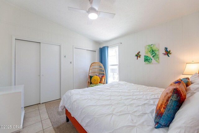 5801 Pinetree Avenue A, B, C & D, Panama City, FL 32408 - tiled bedroom with lofted ceiling, ceiling fan, and multiple closets
