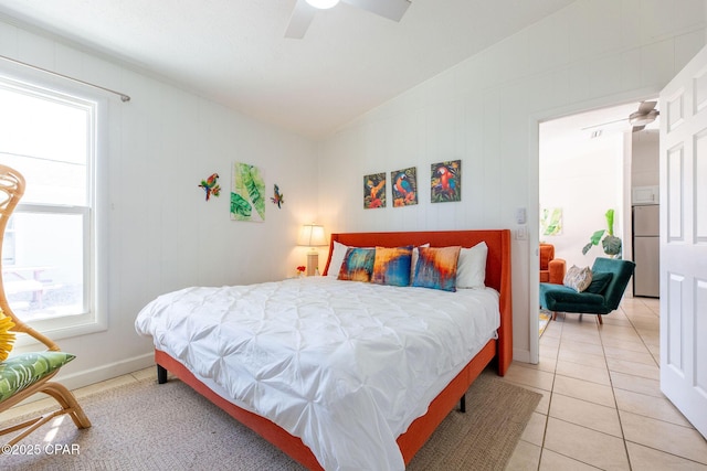 5801 Pinetree Avenue A, B, C & D, Panama City, FL 32408 - bedroom with vaulted ceiling, freestanding refrigerator, multiple windows, light tile patterned floors, and a ceiling fan