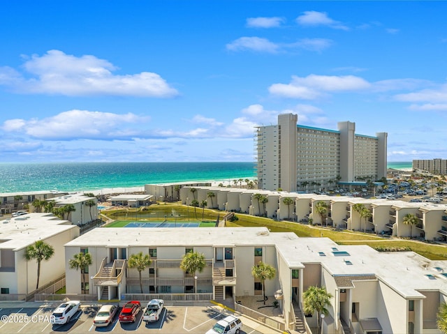 bird's eye view featuring a water view and a view of the beach