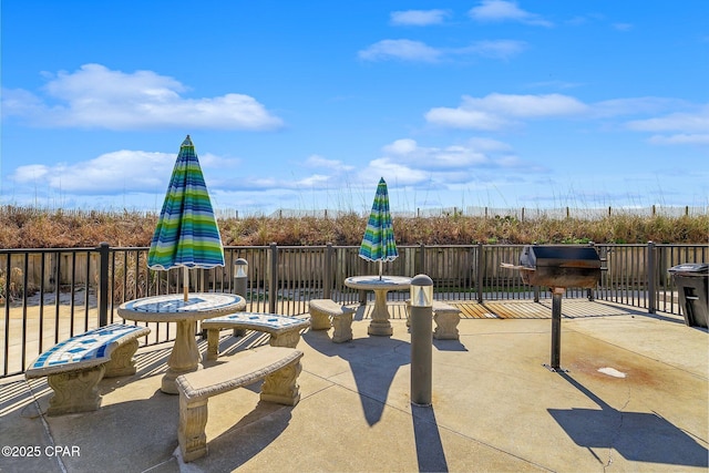 view of patio / terrace with fence