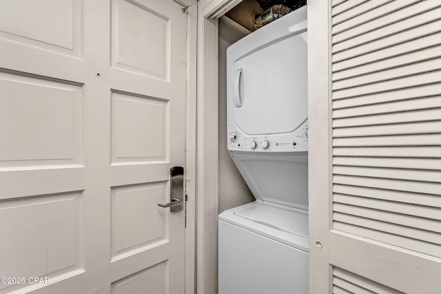 laundry area featuring laundry area and stacked washing maching and dryer