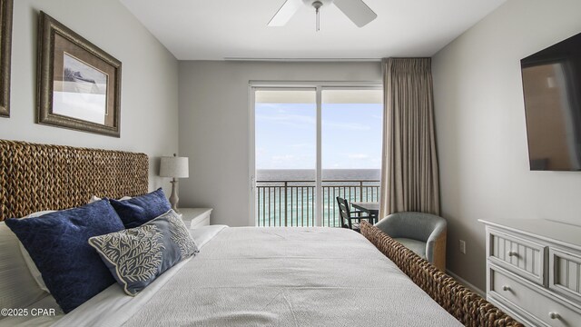 bedroom featuring access to outside and a ceiling fan
