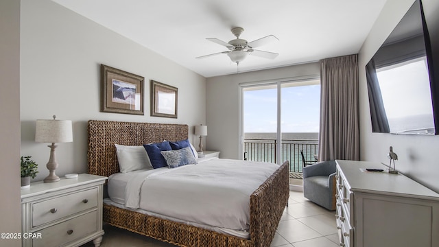 bedroom featuring access to outside, ceiling fan, and light tile patterned floors