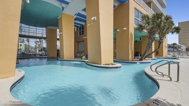 pool with a patio