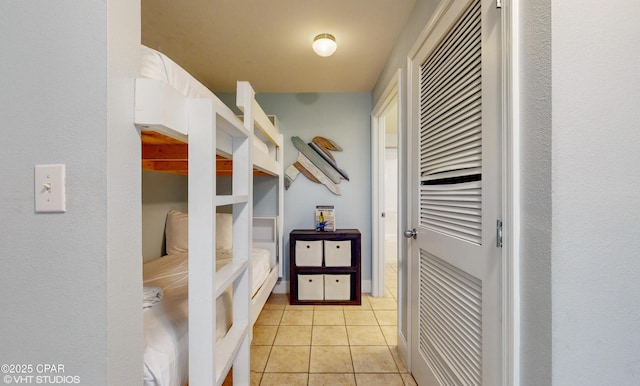 mudroom with light tile patterned floors