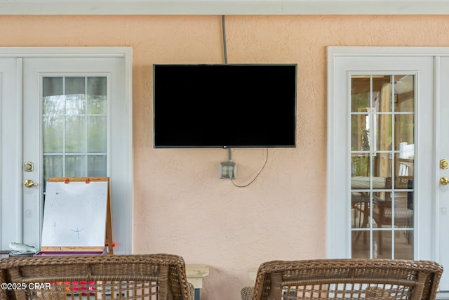 exterior details featuring stucco siding