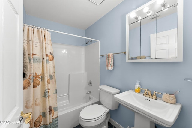 bathroom featuring visible vents, shower / tub combo, a sink, and toilet