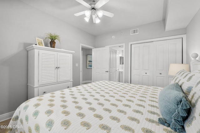 bedroom with baseboards, visible vents, a ceiling fan, and a closet