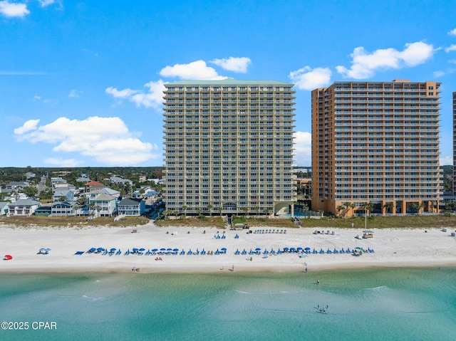 bird's eye view with a view of the beach and a water view