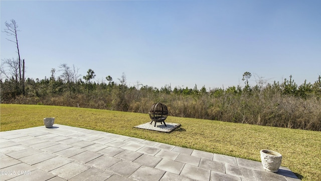 exterior space with an outdoor fire pit