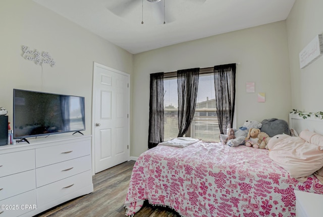 bedroom featuring ceiling fan and light wood-style flooring