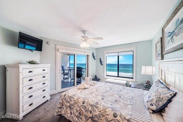 carpeted bedroom featuring a ceiling fan, access to outside, and baseboards