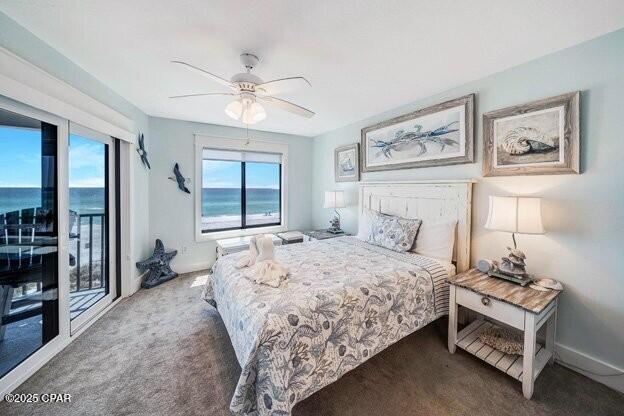 carpeted bedroom featuring access to outside, baseboards, and a ceiling fan