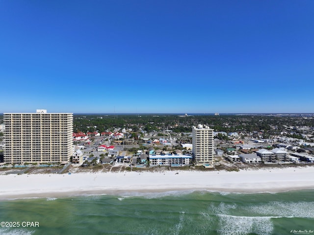 bird's eye view featuring a view of city, a water view, and a view of the beach