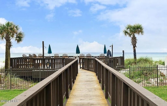 view of community with a water view