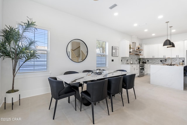 21403 Sunset Ave, Panama City Beach, FL 32413 - dining area featuring plenty of natural light and recessed lighting