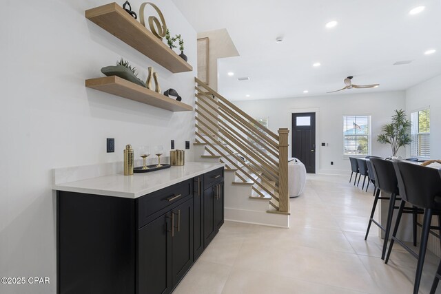 21403 Sunset Ave, Panama City Beach, FL 32413 - bar featuring recessed lighting, stairs, baseboards, and ceiling fan