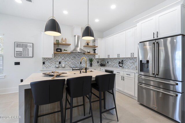 21403 Sunset Ave, Panama City Beach, FL 32413 - kitchen featuring high end refrigerator, open shelves, decorative backsplash, light countertops, and recessed lighting