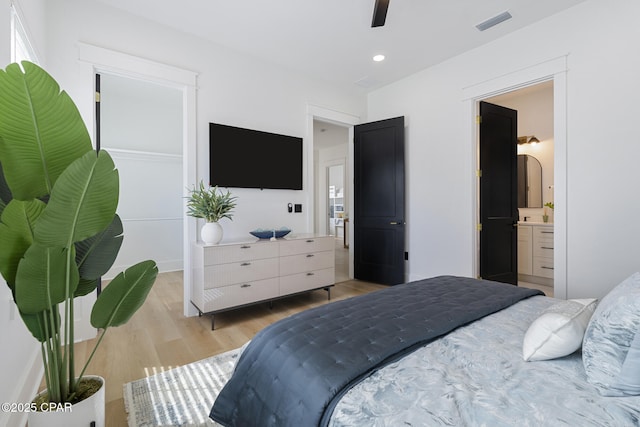 21403 Sunset Ave, Panama City Beach, FL 32413 - bedroom featuring light wood finished floors, ceiling fan, connected bathroom, and recessed lighting