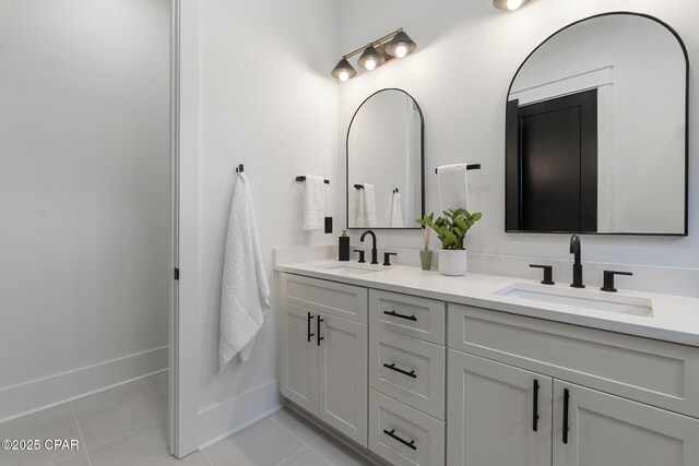 21403 Sunset Ave, Panama City Beach, FL 32413 - full bath with double vanity, tile patterned flooring, and baseboards