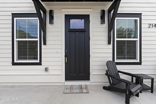 21403 Sunset Ave, Panama City Beach, FL 32413 - property entrance with a porch