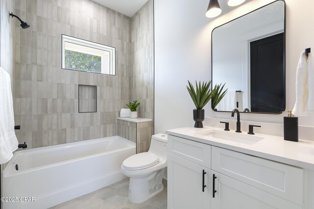 21403 Sunset Ave, Panama City Beach, FL 32413 - full bathroom with toilet, vanity, shower / bathtub combination, and tile patterned flooring