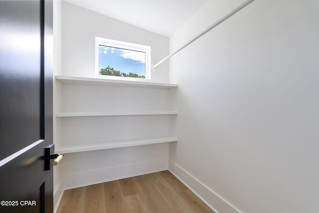 21403 Sunset Ave, Panama City Beach, FL 32413 - spacious closet with wood finished floors