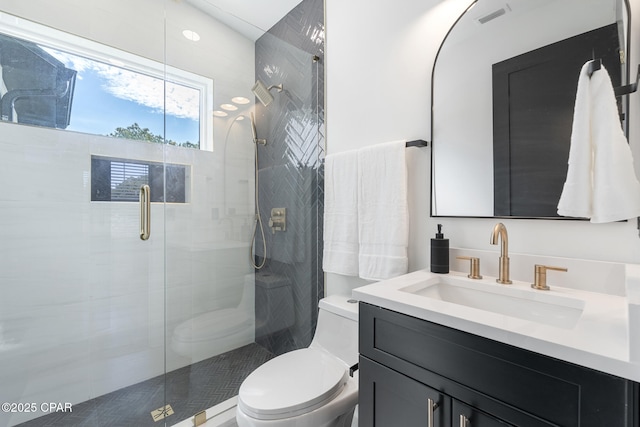 21403 Sunset Ave, Panama City Beach, FL 32413 - full bathroom featuring toilet, vanity, and a shower stall
