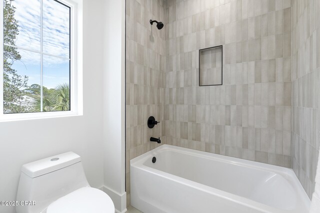 21403 Sunset Ave, Panama City Beach, FL 32413 - full bath featuring toilet, bathing tub / shower combination, and baseboards