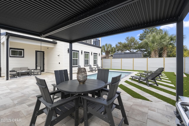 21403 Sunset Ave, Panama City Beach, FL 32413 - fenced backyard with outdoor lounge area, a patio area, and outdoor dining area