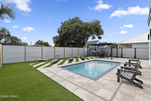 21403 Sunset Ave, Panama City Beach, FL 32413 - view of pool featuring a patio area and outdoor dining area