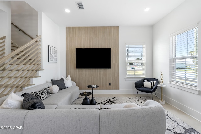 21403 Sunset Ave, Panama City Beach, FL 32413 - living room with baseboards, healthy amount of natural light, stairs, and recessed lighting