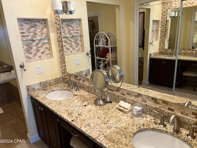 full bath featuring a sink and double vanity