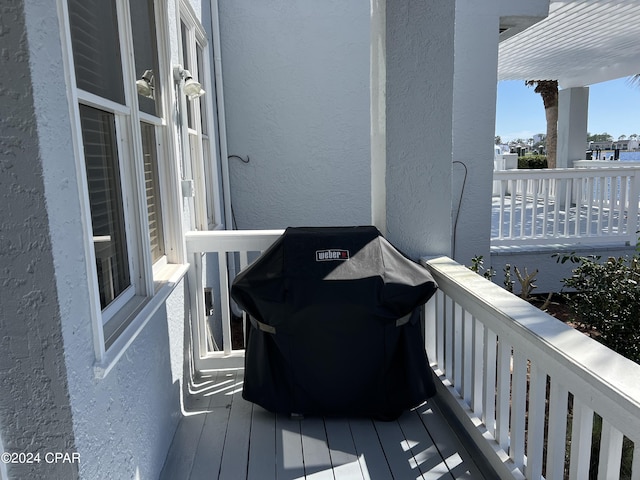 balcony featuring area for grilling