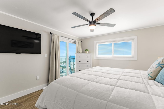 bedroom with ornamental molding, ceiling fan, wood finished floors, access to outside, and baseboards