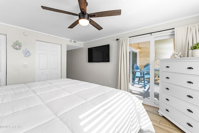 bedroom featuring access to exterior, visible vents, ornamental molding, and light wood finished floors