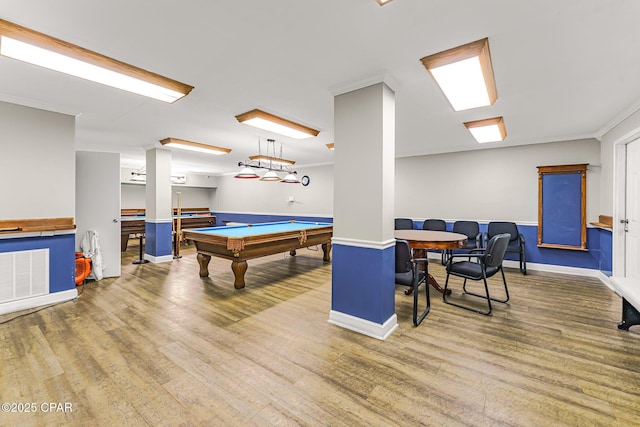 playroom featuring visible vents, billiards, ornamental molding, and wood finished floors