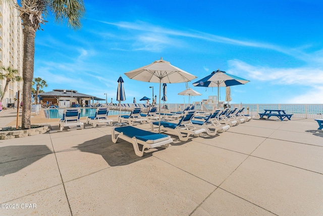 view of patio / terrace featuring a water view