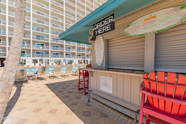 view of patio / terrace with a baseboard heating unit