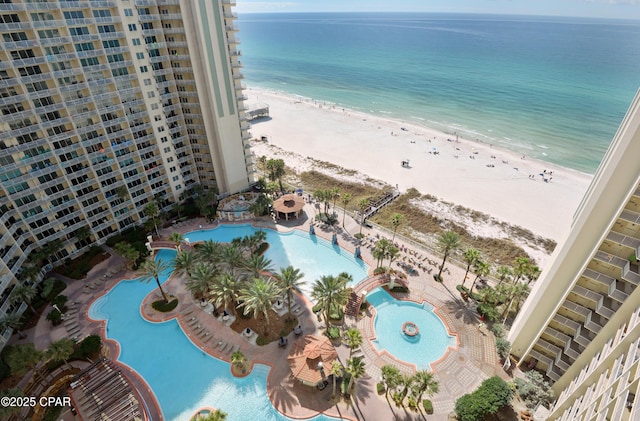 bird's eye view with a water view and a view of the beach