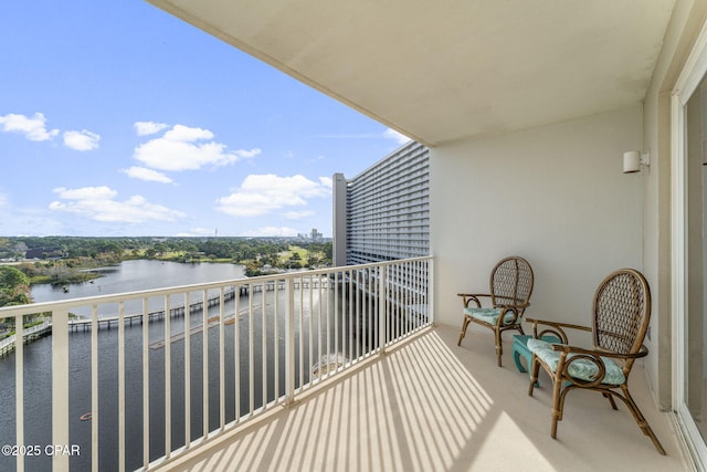 balcony featuring a water view