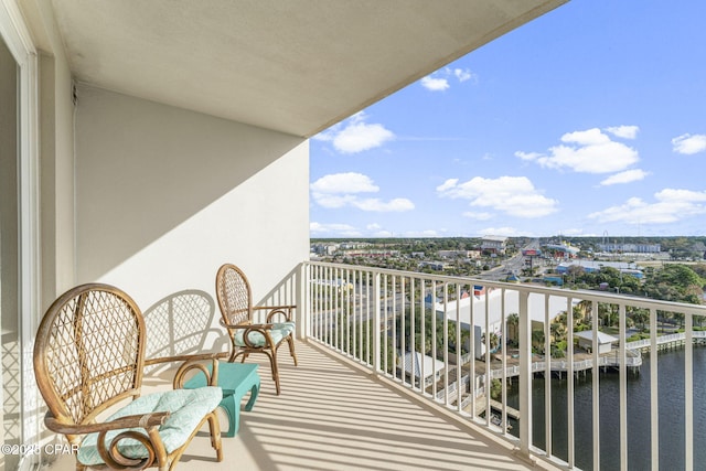 balcony featuring a water view