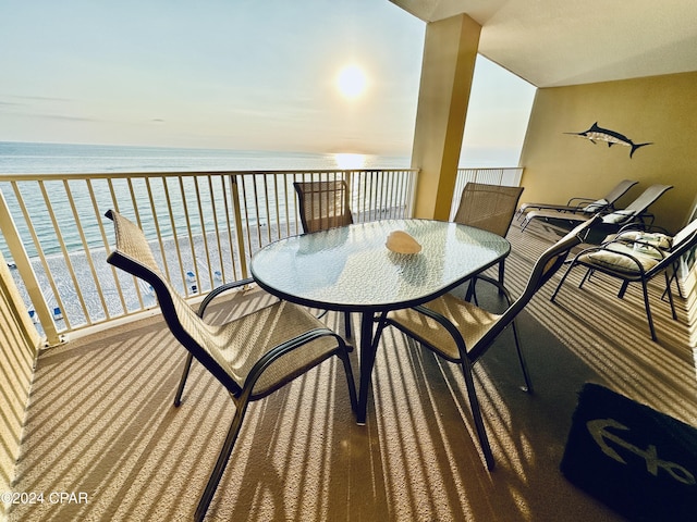 balcony featuring a water view