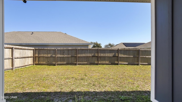 view of yard featuring a fenced backyard