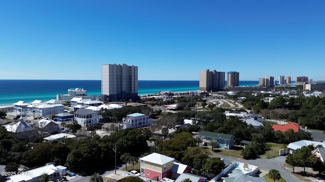 birds eye view of property featuring a view of city and a water view