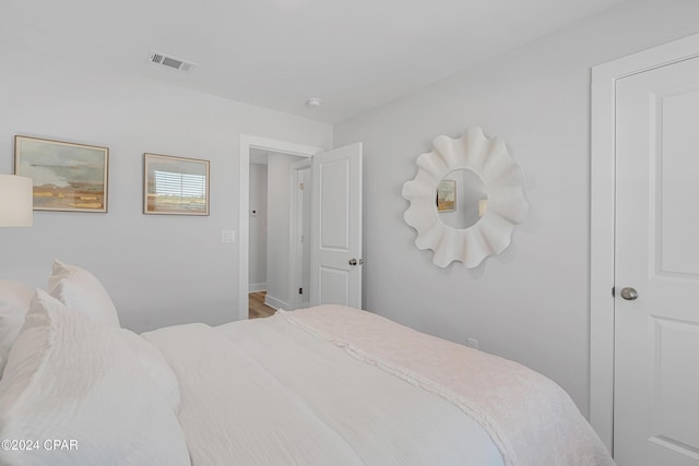 bedroom featuring visible vents