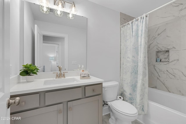 bathroom with shower / tub combo, vanity, and toilet