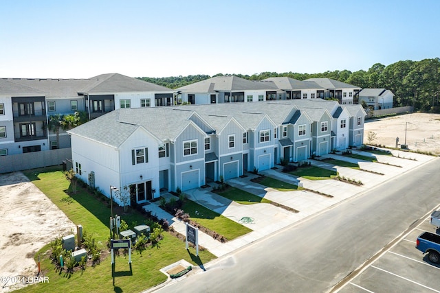 drone / aerial view with a residential view