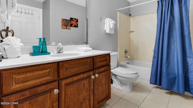 full bath with tile patterned flooring, shower / bath combination with curtain, toilet, and vanity