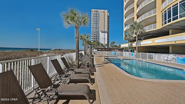 community pool featuring a patio area